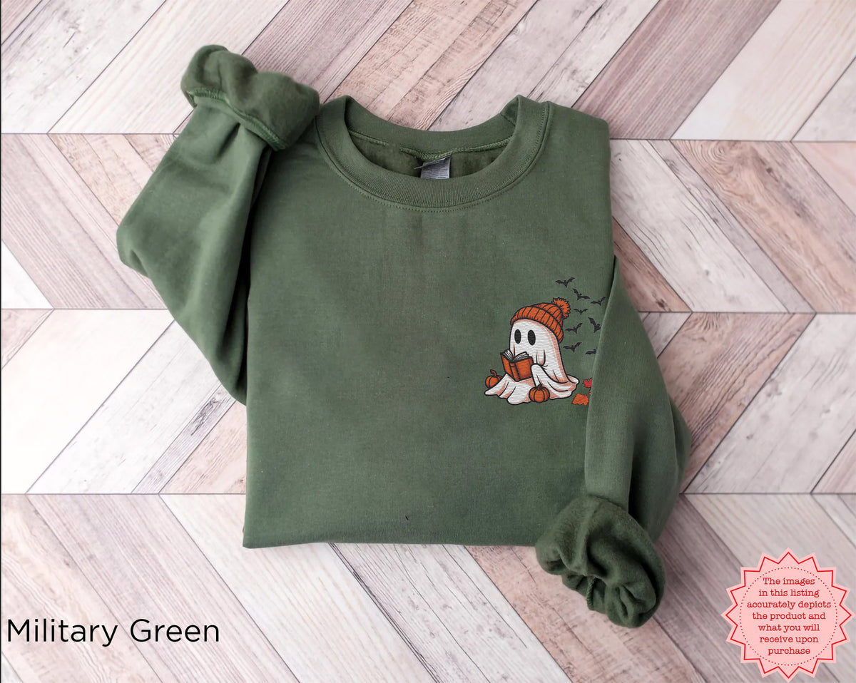 Cozy fall outfit featuring a dark embroidered ghost sweatshirt perfect for reading, Halloween and autumn days