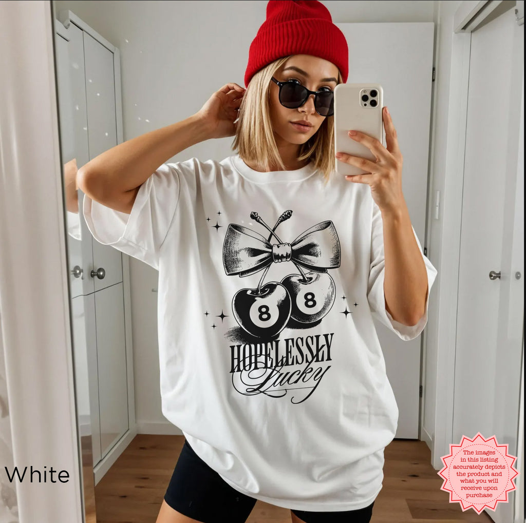 Clean and fresh "Hopelessly Lucky" cherry graphic tee, ideal for a fun and casual summer outfit.