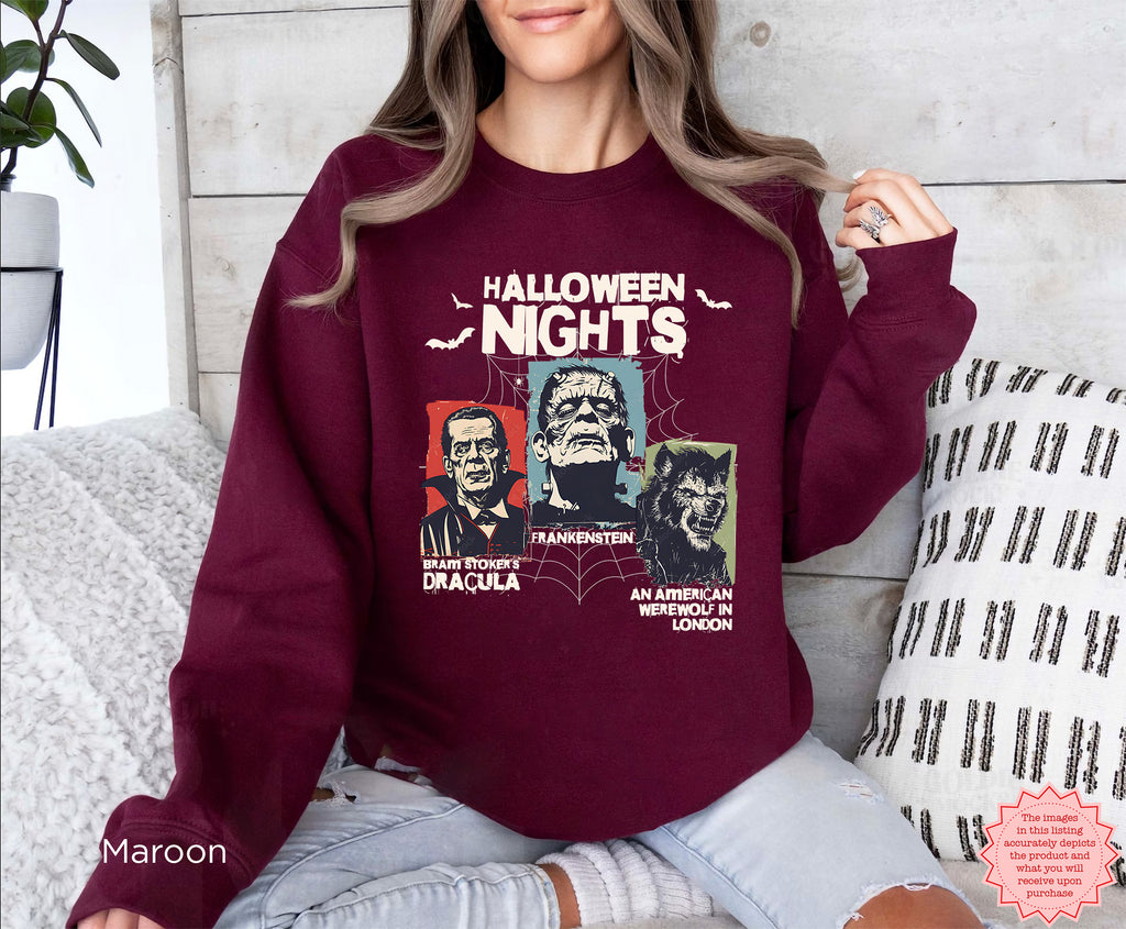 Horror Nights Halloween graphic sweatshirt in Maroon Red featuring classic horror movie-inspired portraits and bold Halloween Nights typography.