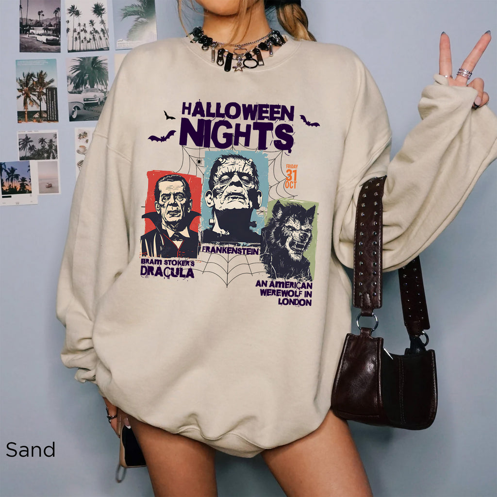 Horror Nights Halloween graphic sweatshirt in Sand with vintage-inspired horror movie portraits and bold Halloween Nights typography.