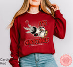 Front view of vintage Christmas crewneck sweatshirt featuring playful retro artwork