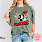 Close-up of detailed festive Christmas graphic printed on a vintage-style T-shirt