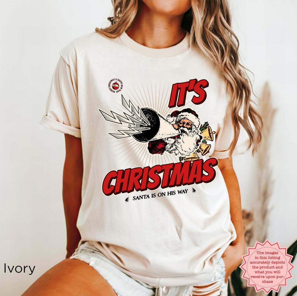 Front view of vintage Christmas T-shirt featuring a playful retro holiday graphic