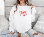Full front view of the REBBELLA Joyeux Noël sweatshirt showcasing its minimalist French Christmas design and delicate botanical detail