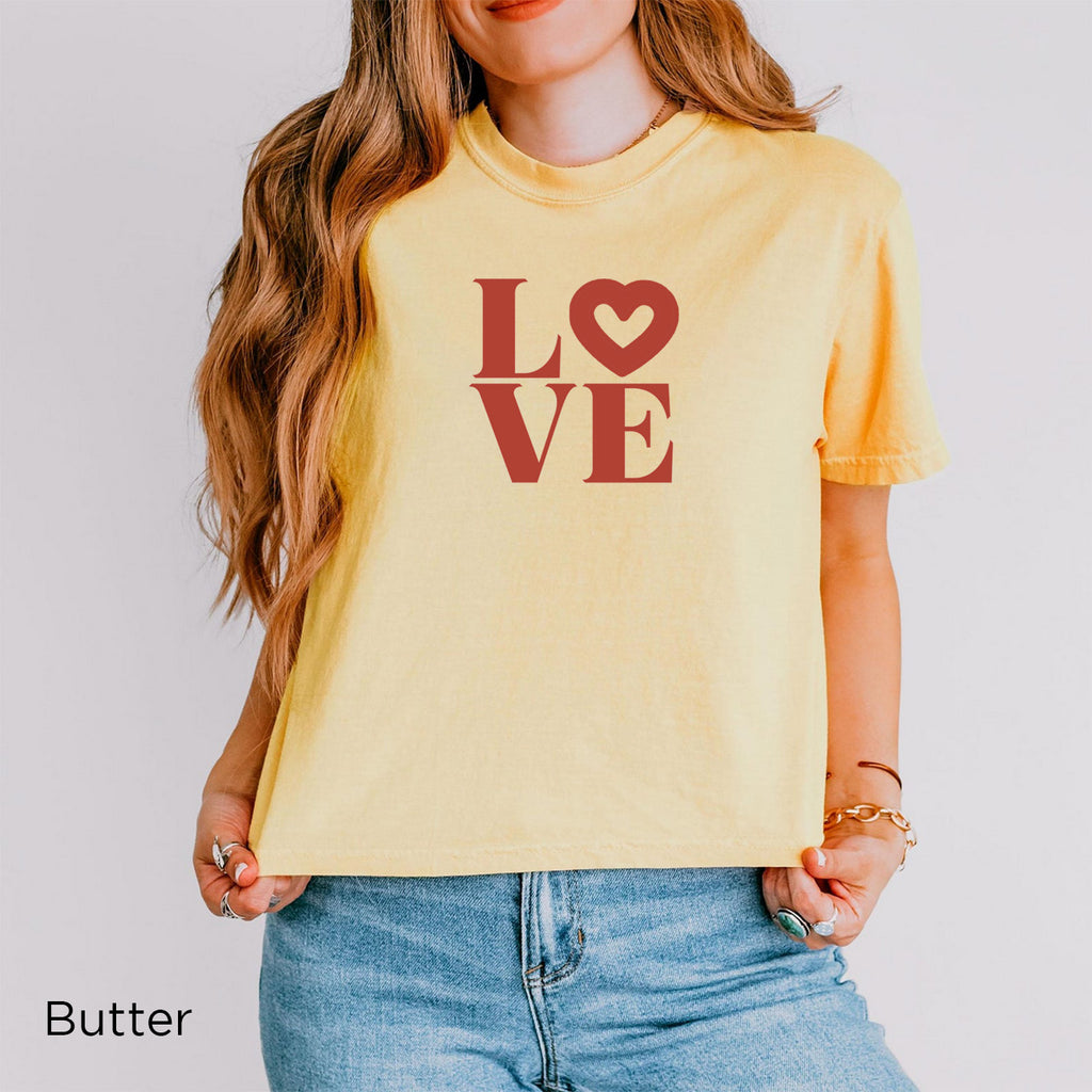 Women’s Butter yellow LOVE heart graphic T-shirt with terracotta LO♡VE design