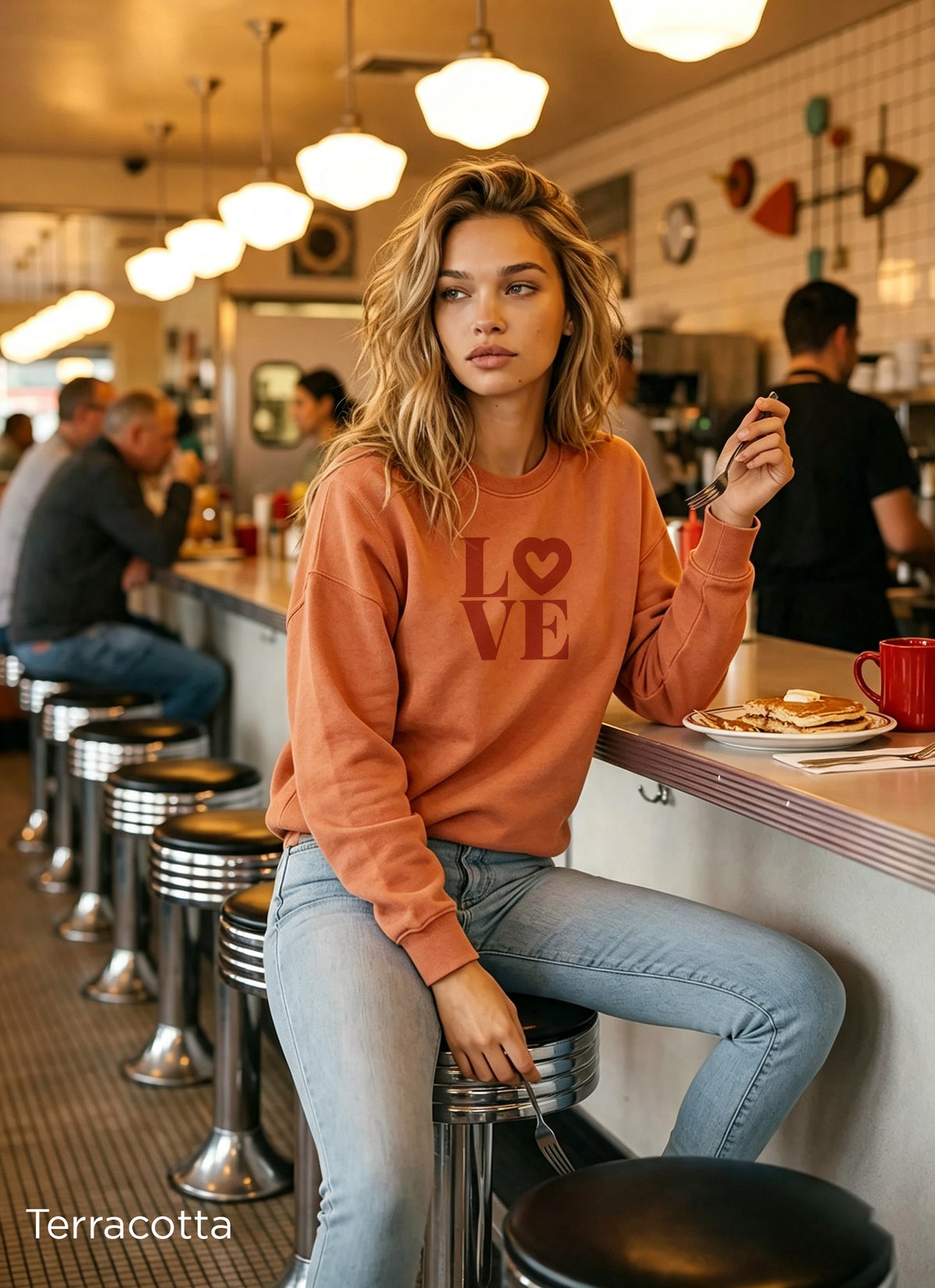Feminine women's LOVE heart sweatshirt in terracotta
