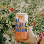 Summer-inspired glass tumbler with bright lemon graphics for iced coffee, cocktails, and mocktails