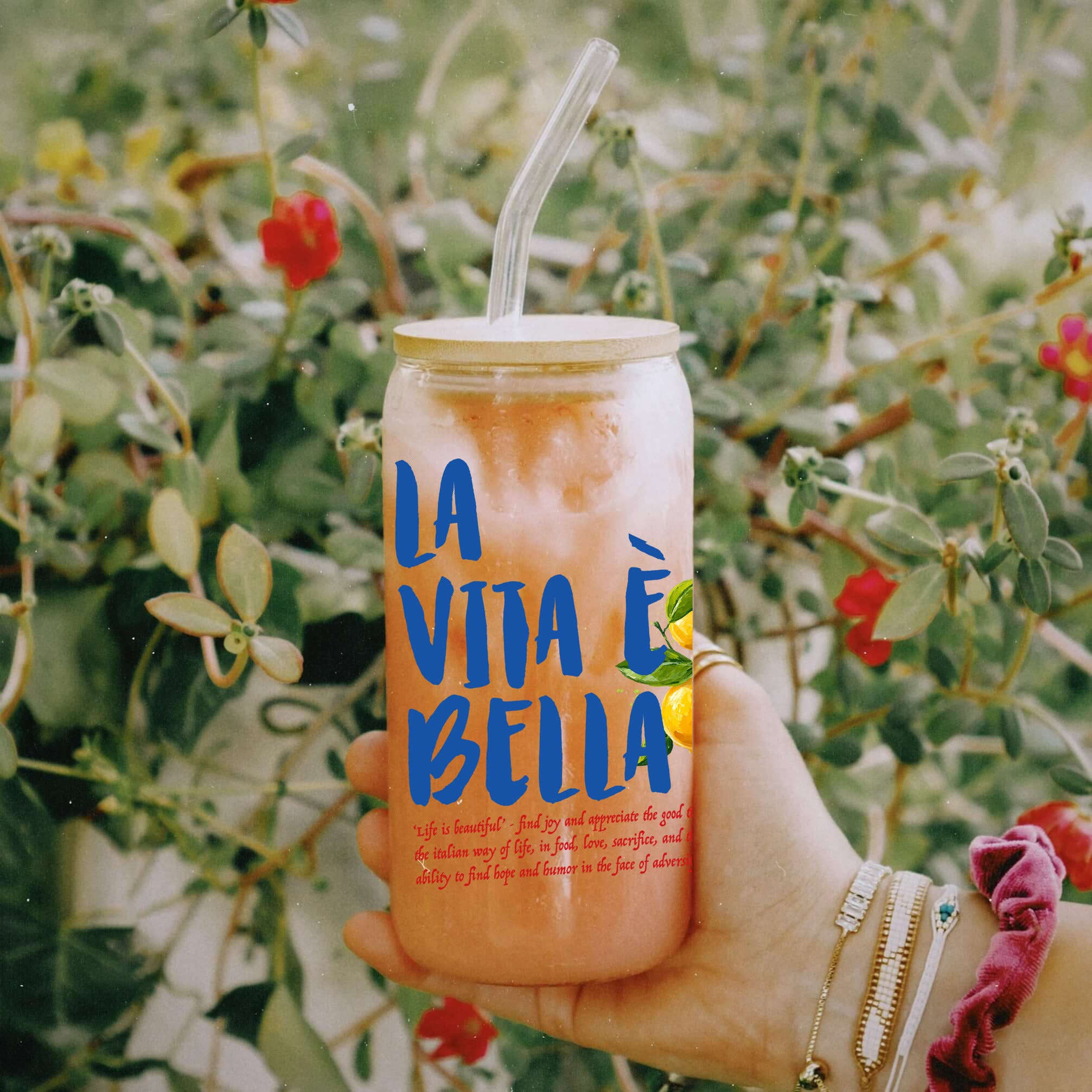 Summer-inspired glass tumbler with bright lemon graphics for iced coffee, cocktails, and mocktails