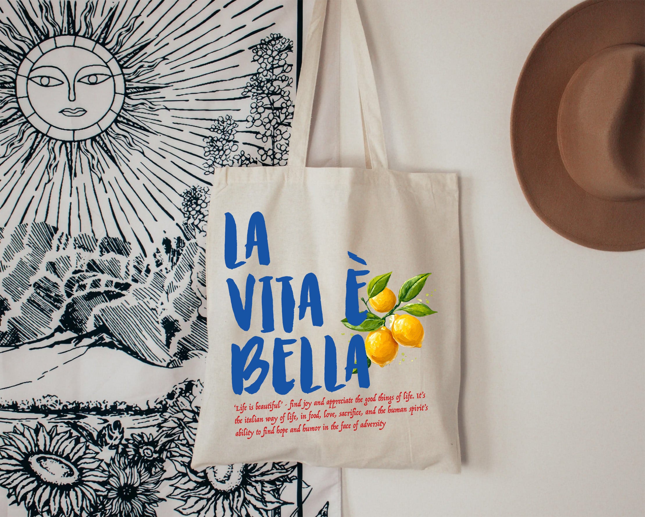 Mediterranean lemon tote bag displayed on rustic wood background featuring Italian-inspired typography and citrus illustrations.