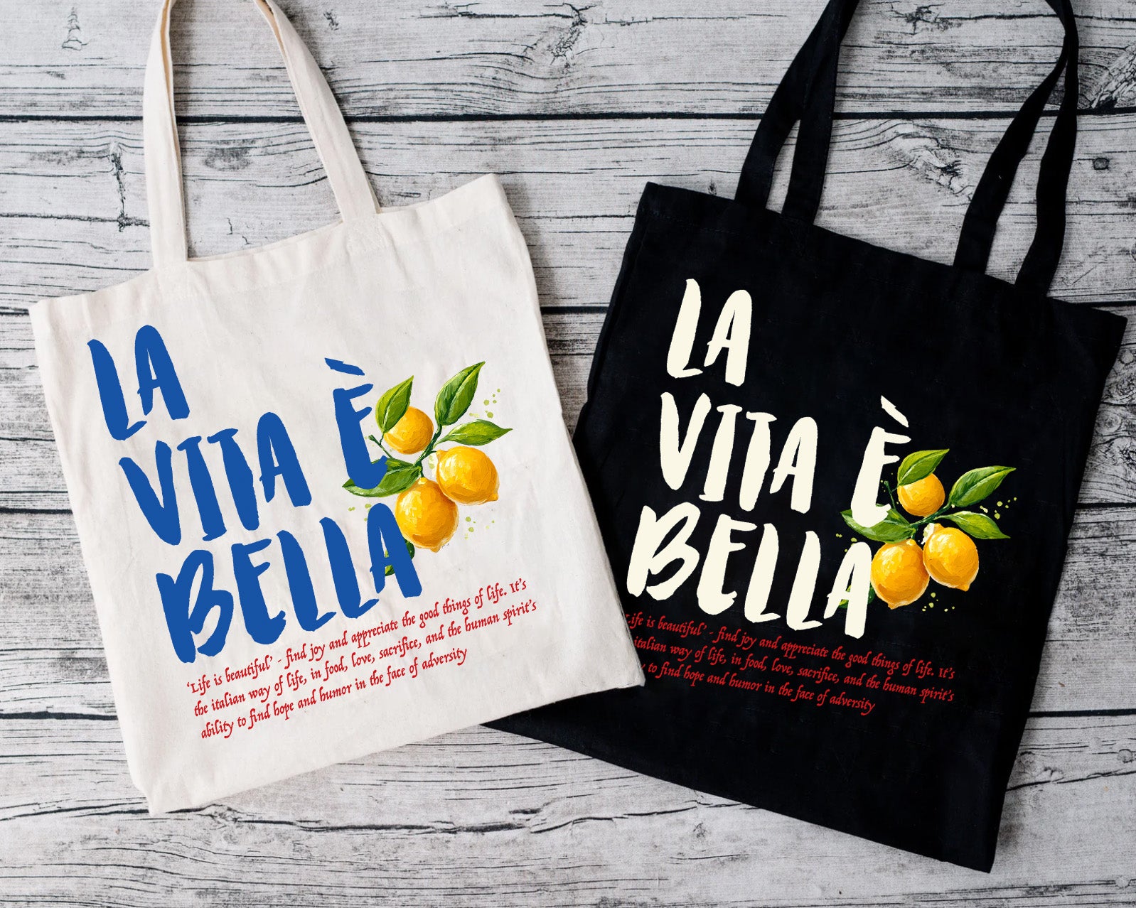Black cotton canvas tote bag with La Vita è Bella quote and vibrant lemon artwork celebrating Italian lifestyle and Mediterranean living.