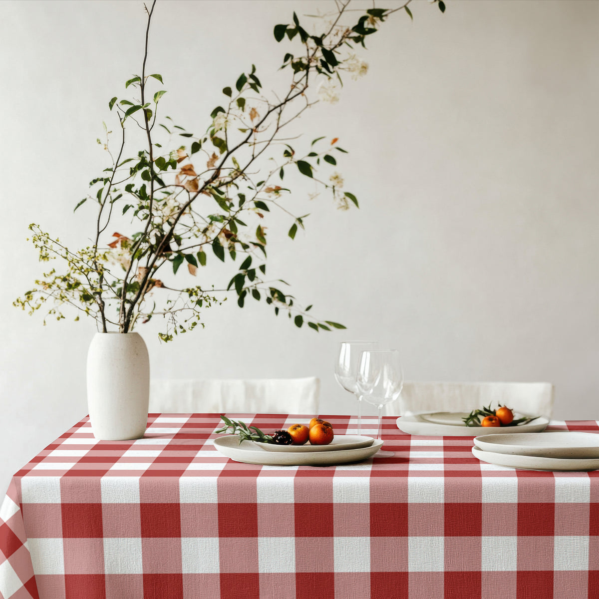 Red and white gingham tablecloth creating a warm, traditional setting for Christmas dinner and family gatherings.