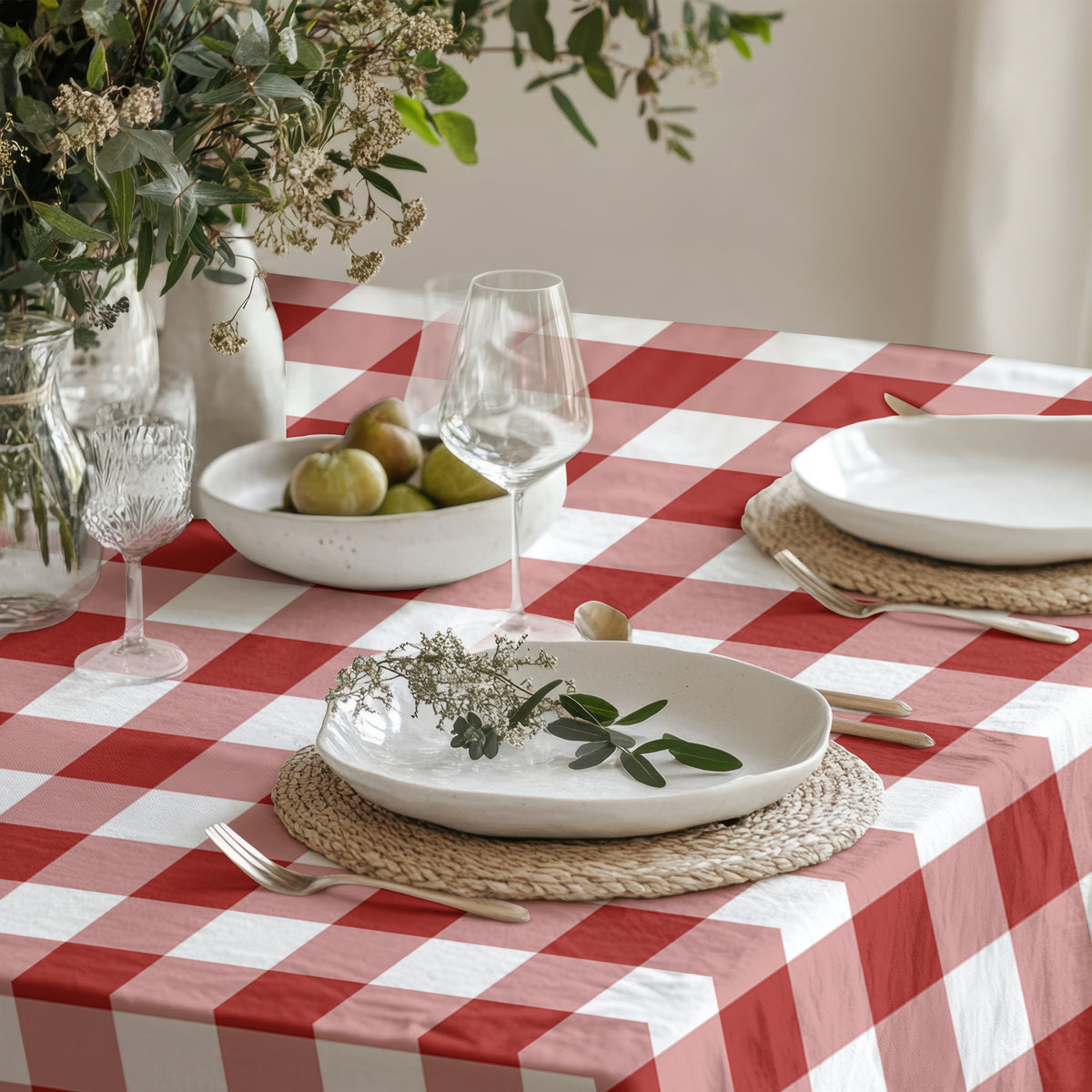 Detailed view of the woven cotton twill texture and red checked pattern of the gingham table linen.