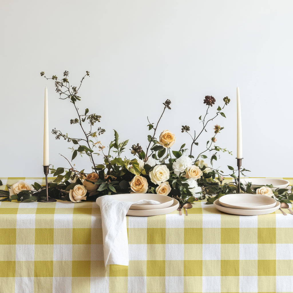Close-up of the yellow and white gingham check pattern on the 100% cotton twill tablecloth.