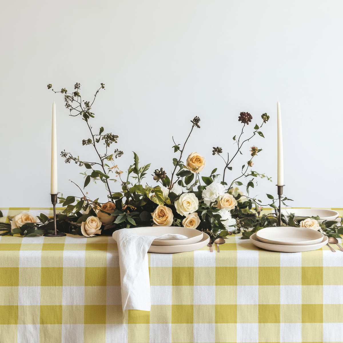 Close-up of the yellow and white gingham check pattern on the 100% cotton twill tablecloth.