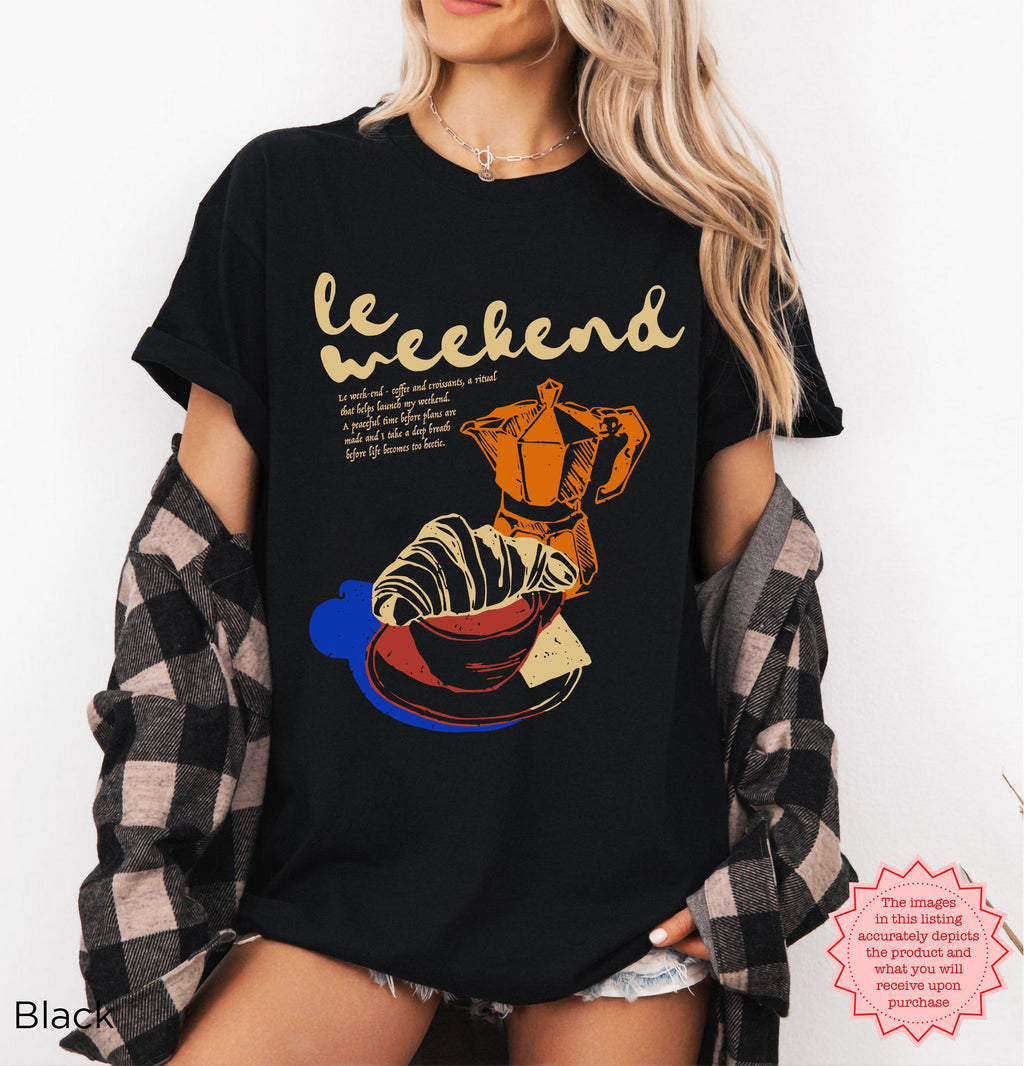French-inspired design with coffee and croissant, a comfy and stylish weekend shirt.