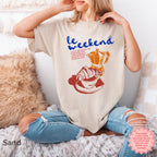 Vintage aesthetic graphic tee featuring a croissant and coffee cup, ideal for relaxed weekends.
