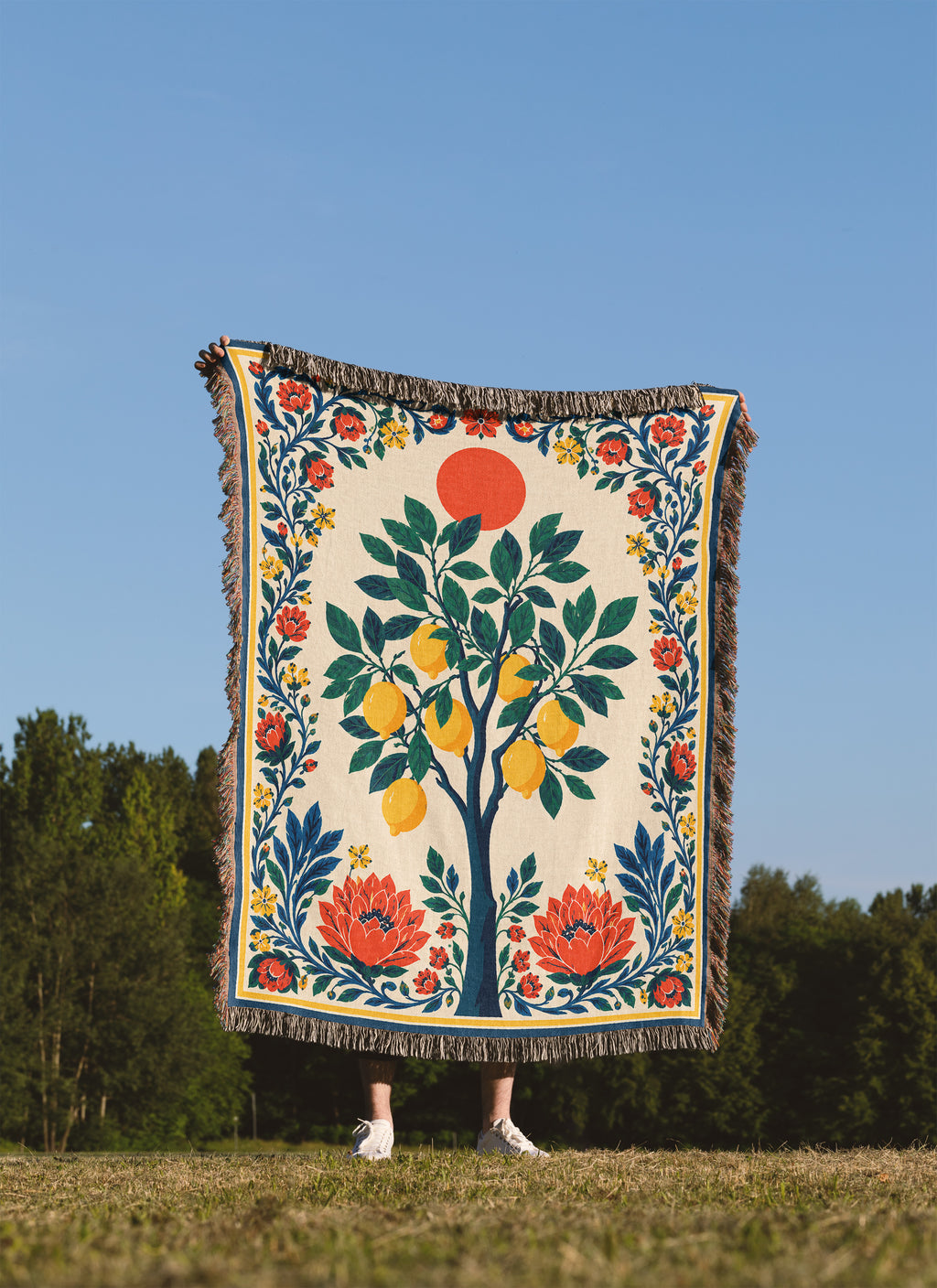 Mediterranean woven blanket with lemon tree artwork, lush green foliage, and elegant floral border design