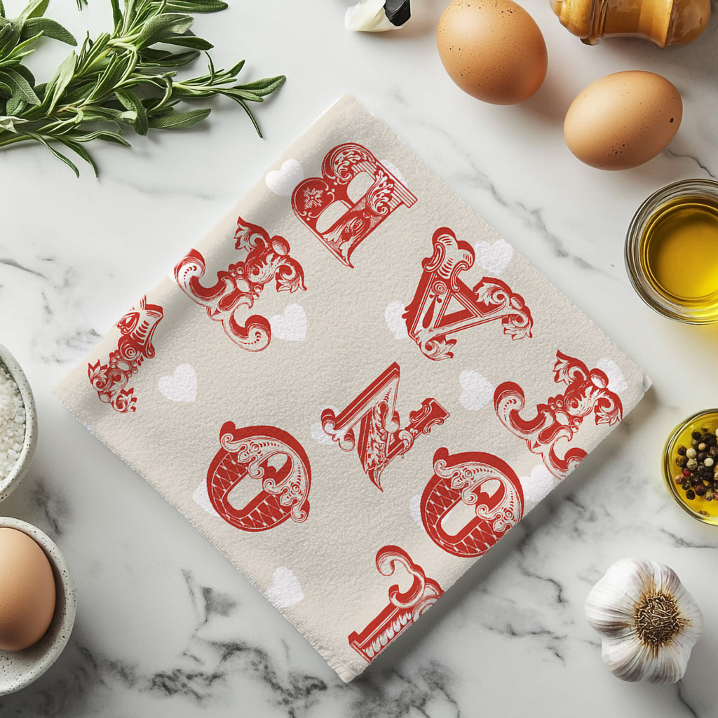 Cotton tea towel styled on marble countertop with herbs and olive oil