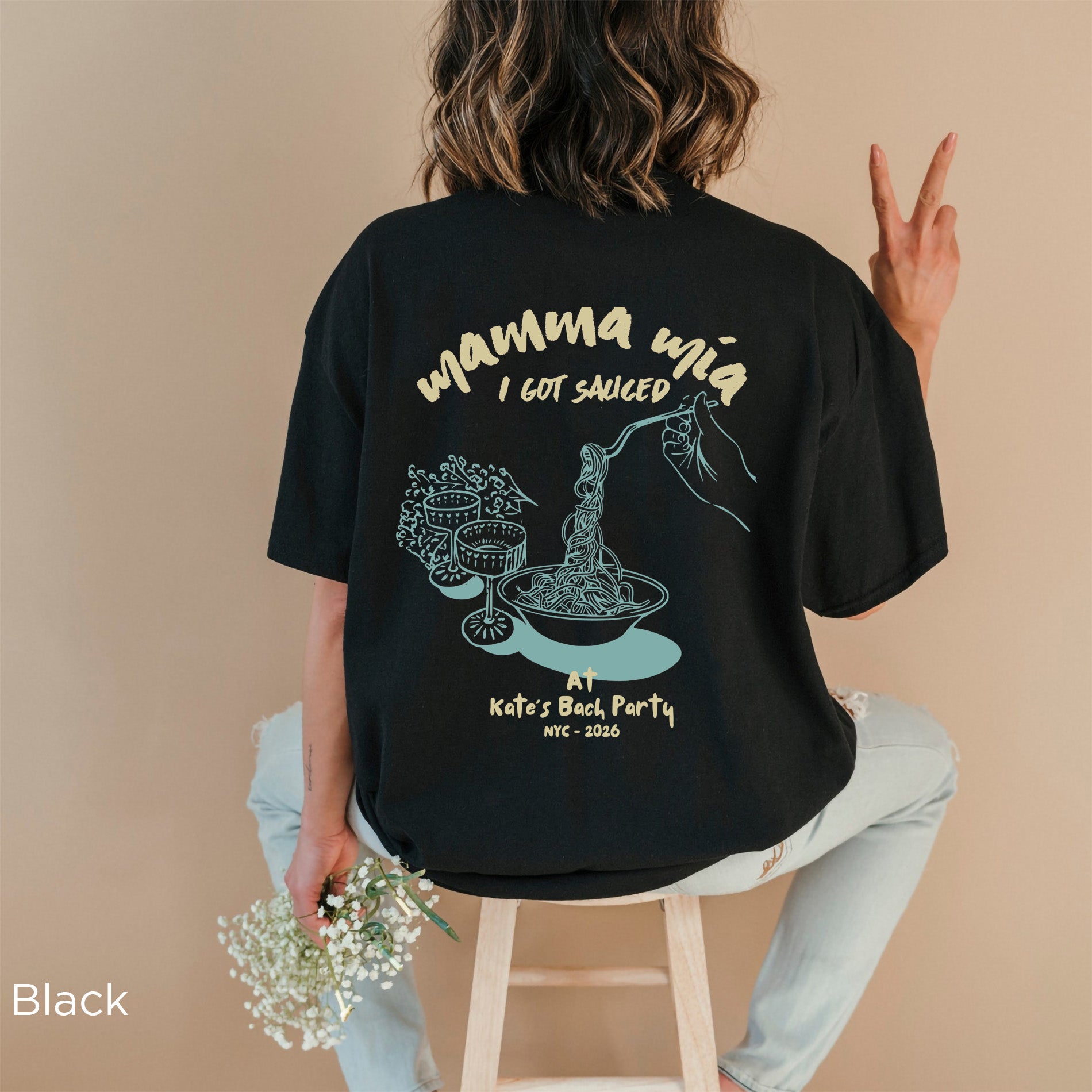 Back view of personalised Mamma Mia I Got Sourced bachelorette shirt with custom bride name, destination and year