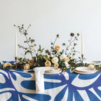 Close-up of blue organic Matisse pattern printed on soft 100% cotton twill fabric