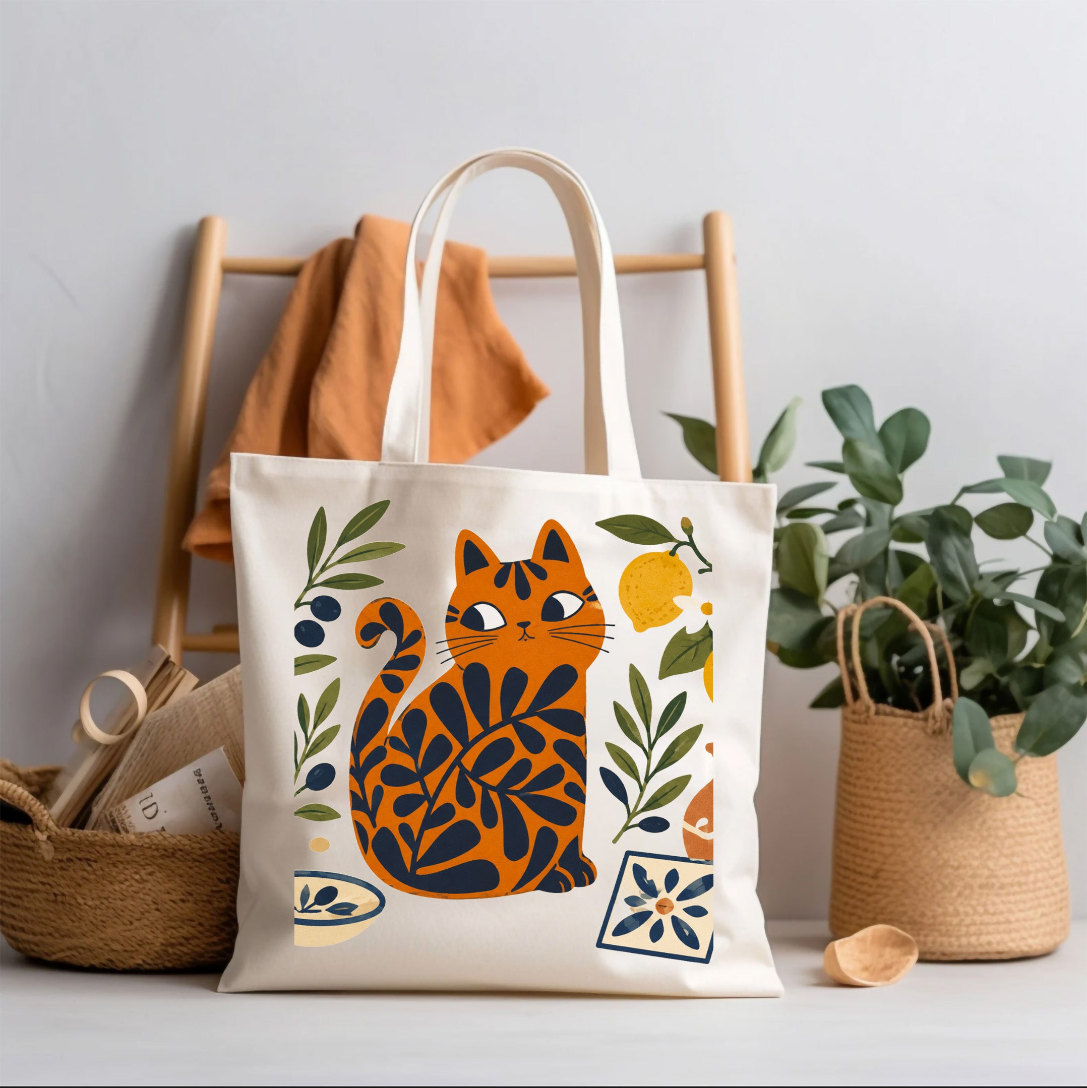 Mediterranean Matisse cat tote bag featuring olive branches, lemons, and coastal tile motifs printed on natural cotton canvas.