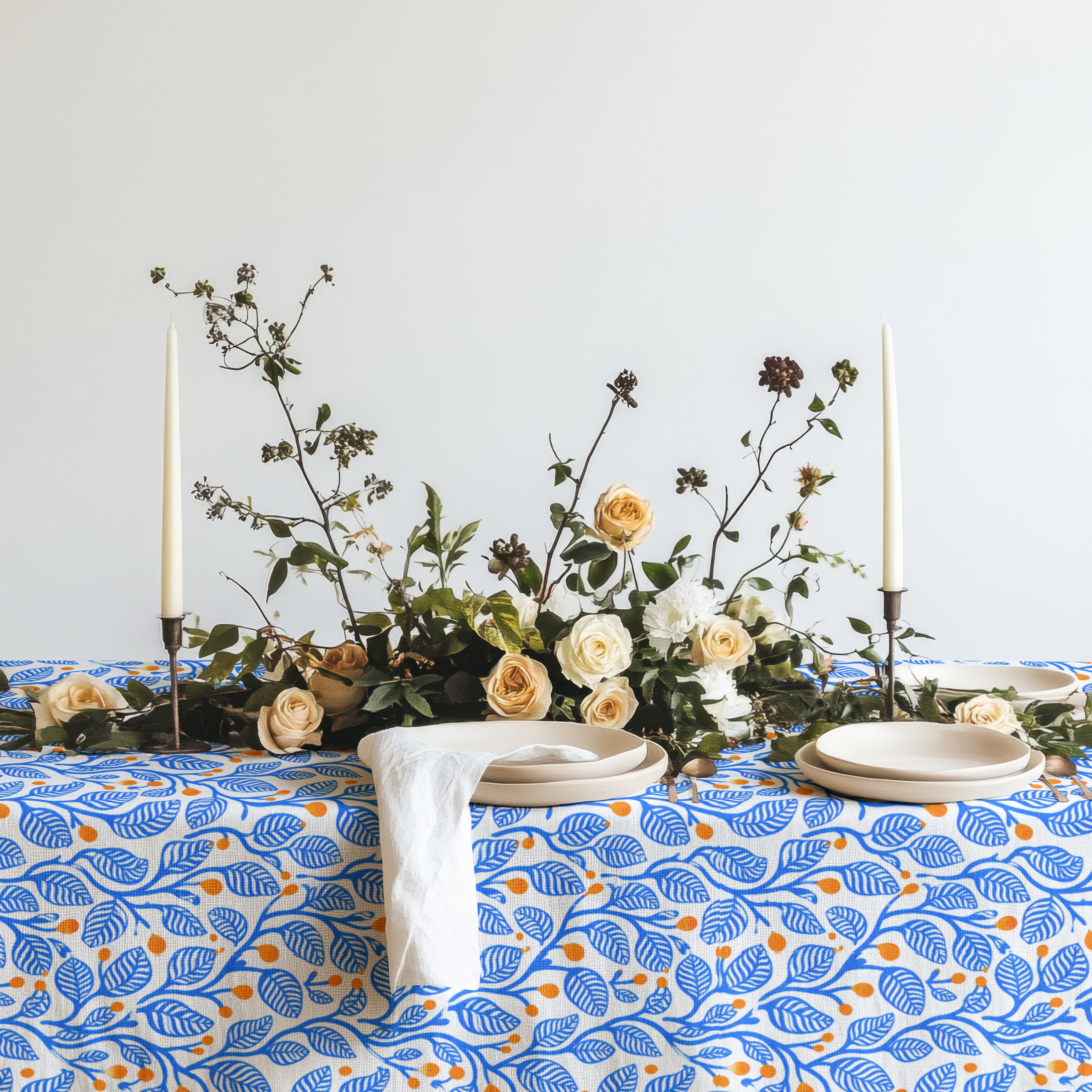 Mediterranean Botanica cotton tablecloth bringing vibrant blue botanical design and artisan-inspired style to the dining table.