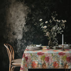 Botanical cotton twill tablecloth with warm coral and sage tones styled for modern Mediterranean dining