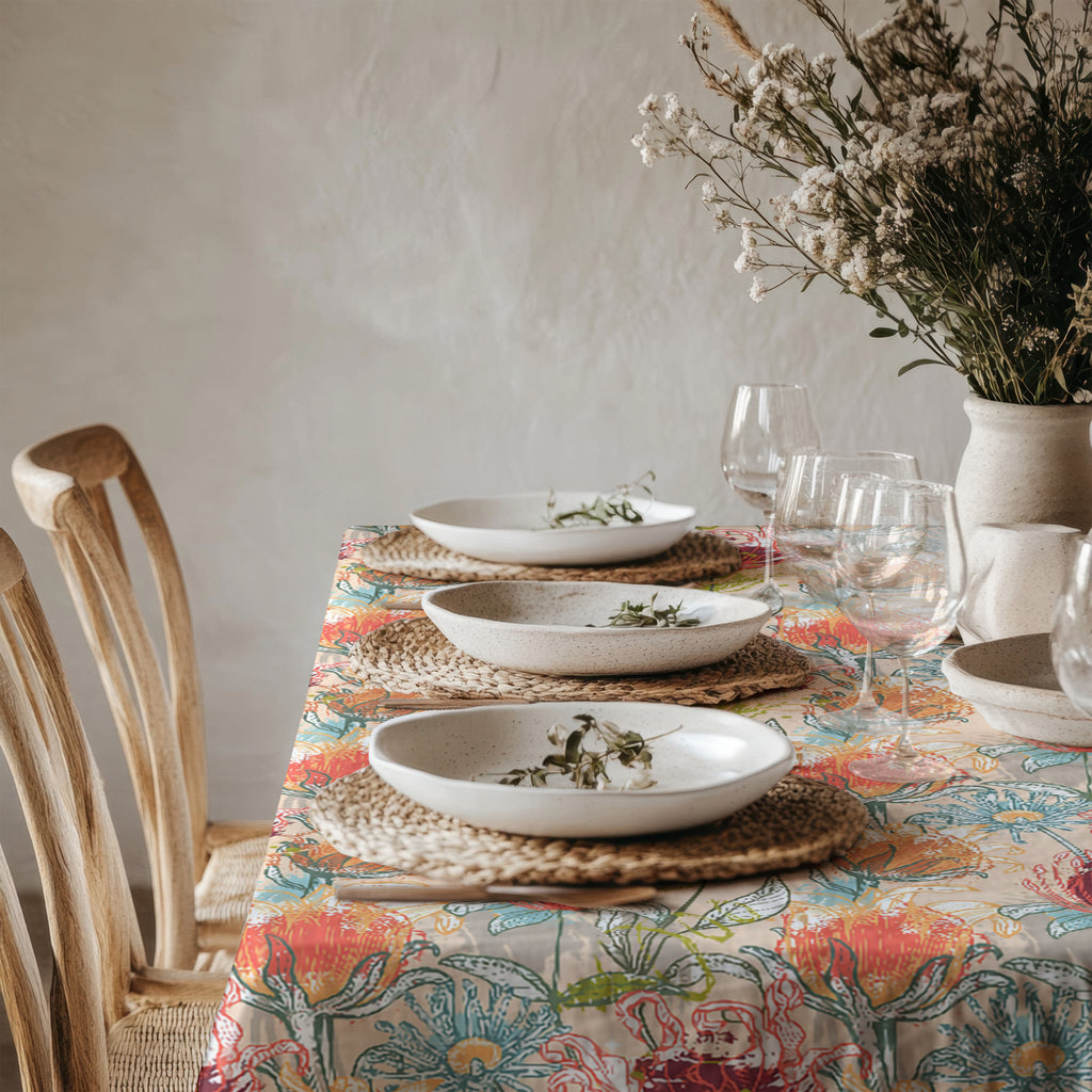 Detailed view of Mediterranean botanical tablecloth fabric showing colorful floral pattern and cotton twill texture