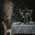 Turkish inspired floral tablecloth styled for an elegant Mediterranean outdoor dining setting