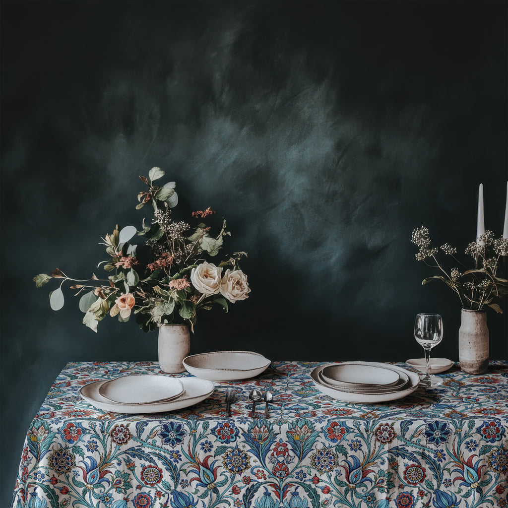 Colourful Mediterranean tablecloth with vintage floral and botanical motifs in blue, red and ivory