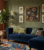 Decorative Mediterranean cushion with illustrated lemons, citrus blossoms and botanical greenery.