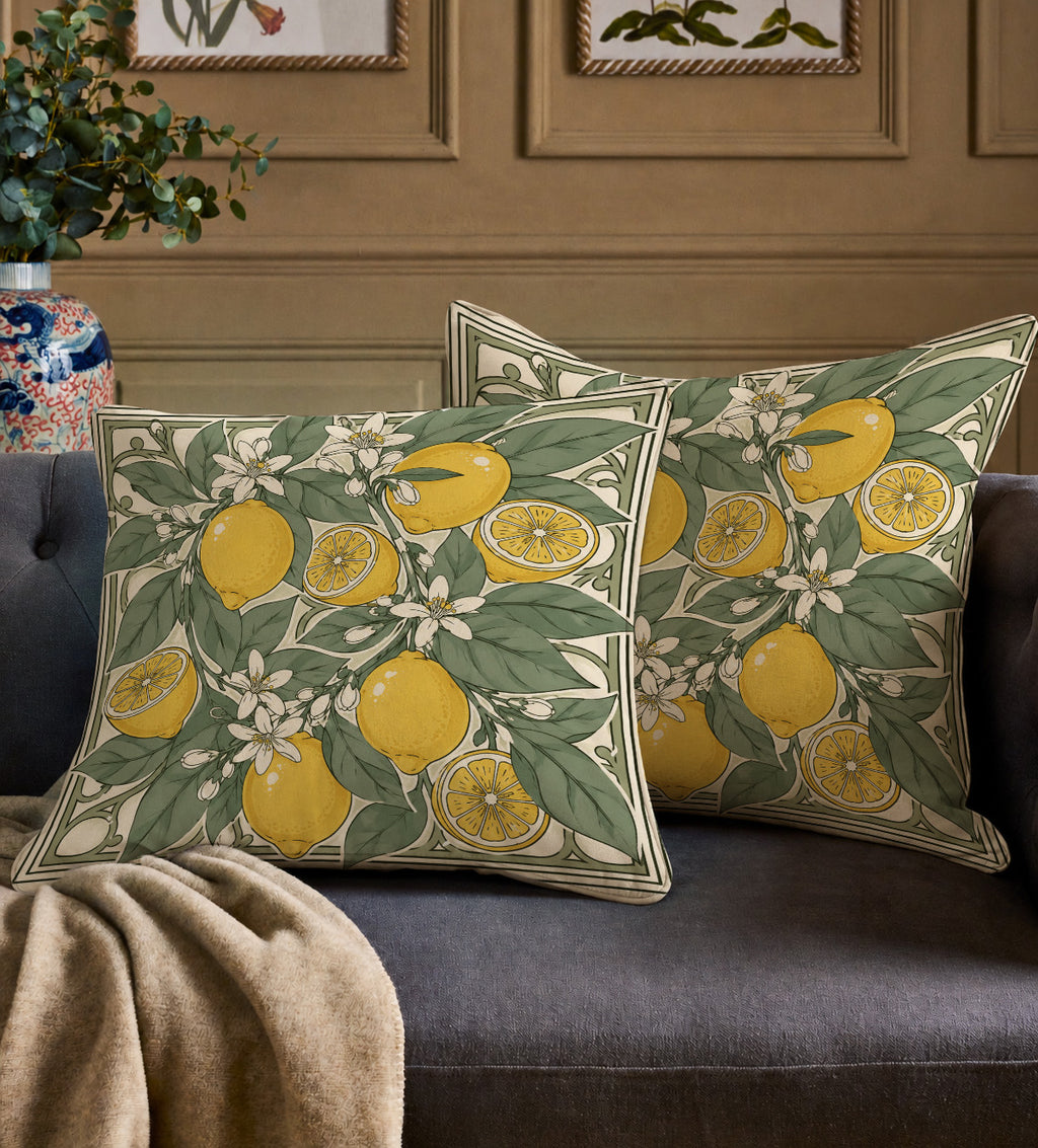 Close-up of faux suede lemon cushion showing detailed citrus botanical illustration and soft texture.