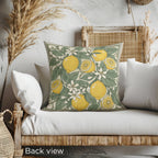Decorative faux suede pillow featuring illustrated lemons and elegant botanical pattern.