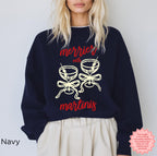 Navy Gildan 18000 crewneck sweatshirt featuring the “Merrier with a Martini” funny Christmas design, cozy holiday cocktail apparel.
