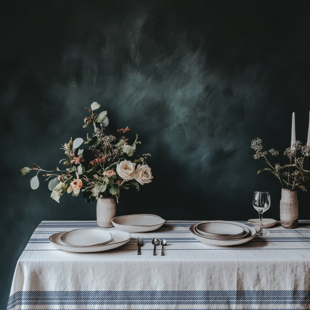 Close-up of French Riviera Heritage Stripe Tablecloth showing delicate blue stripe detailing on soft white cotton twill fabric.
