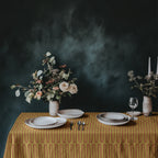 Artisan cotton dining tablecloth featuring warm mustard tones and contemporary repeat design