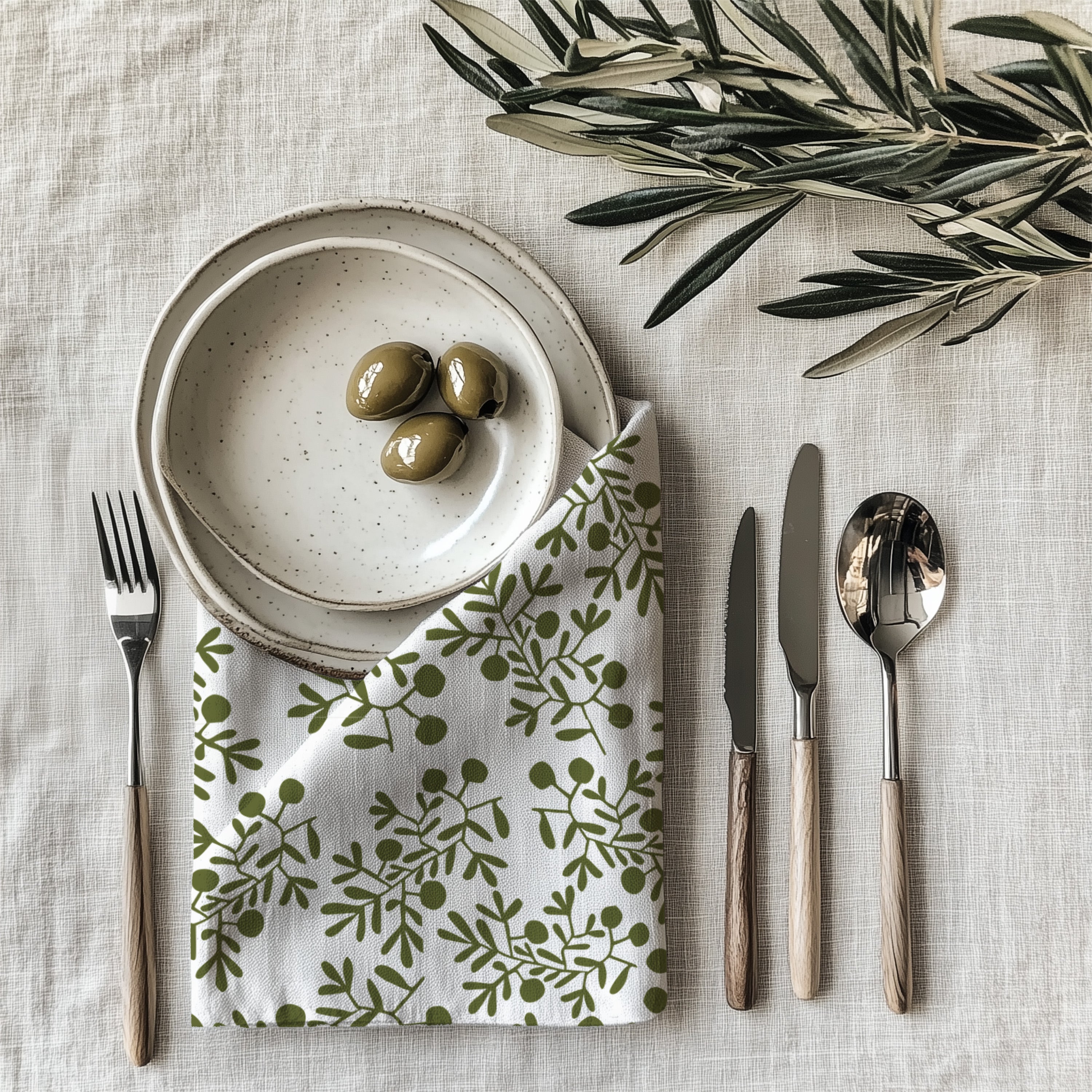 Olive leaf cloth napkin made from 100% cotton twill with neatly hemmed edges for stylish restaurant and home dining