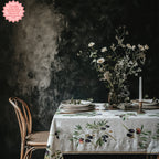 Elegant olive branch tablecloth set on a minimalist dining table with modern decor and tableware