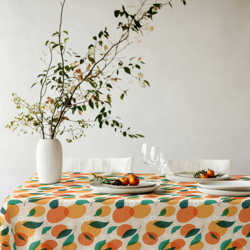 Mediterranean citrus tablecloth paired with ceramic tableware and botanical styling for effortless entertaining.