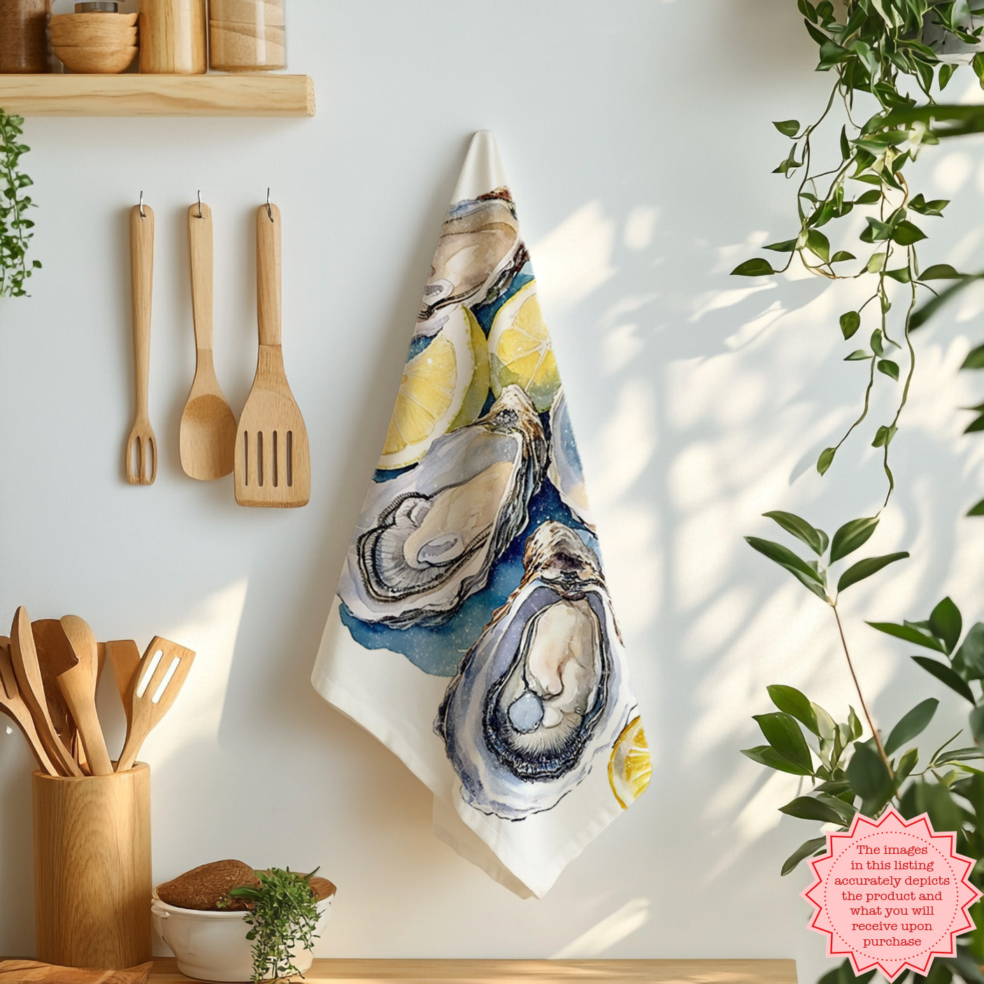 Oyster tea towel folded on marble surface with lemons and kitchen ingredients
