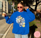 Royal color Oyster Shell sweatshirt with watercolor oyster and lemon design, Gildan 18000 DTG pullover, trendy coastal aesthetic and fisherman lifestyle wear.