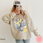 Sand-colored Oyster Shell sweatshirt with watercolor oysters and lemon accents, coastal aesthetic pullover, Gildan 18000 DTG, perfect for nautical lifestyle and ocean-inspired fashion.
