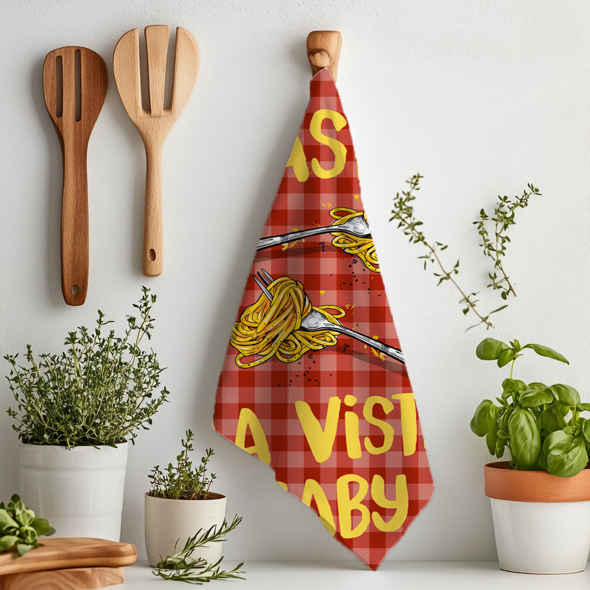 Pasta La Vista Baby cotton twill tea towel with playful pasta illustrations and bold yellow typography on a red checked background.