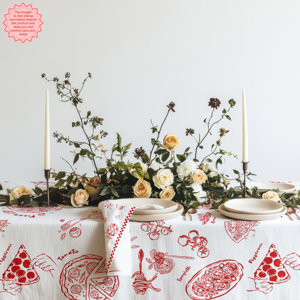 Colorful cotton twill tablecloth featuring hand-drawn pizza, pasta and Italian food illustrations, styled for family dinners and entertaining.