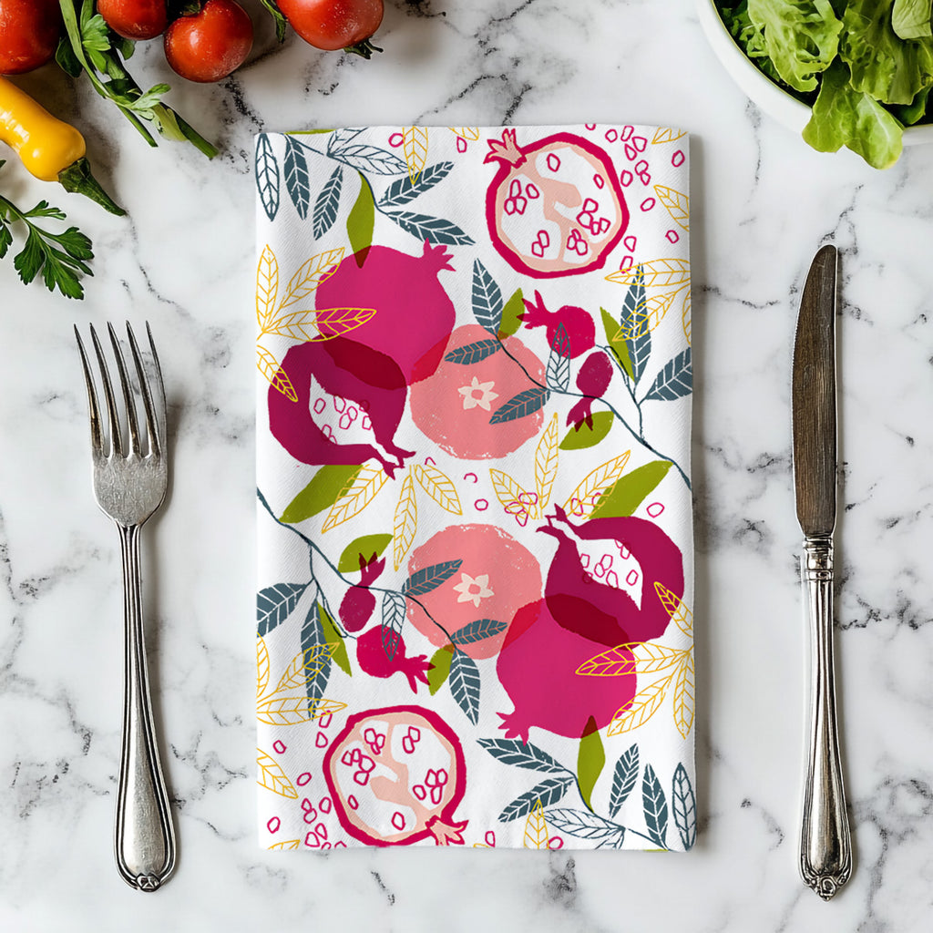 Italian inspired pomegranate tea towel hanging in a modern Mediterranean style kitchen