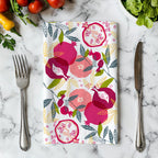 Italian inspired pomegranate tea towel hanging in a modern Mediterranean style kitchen