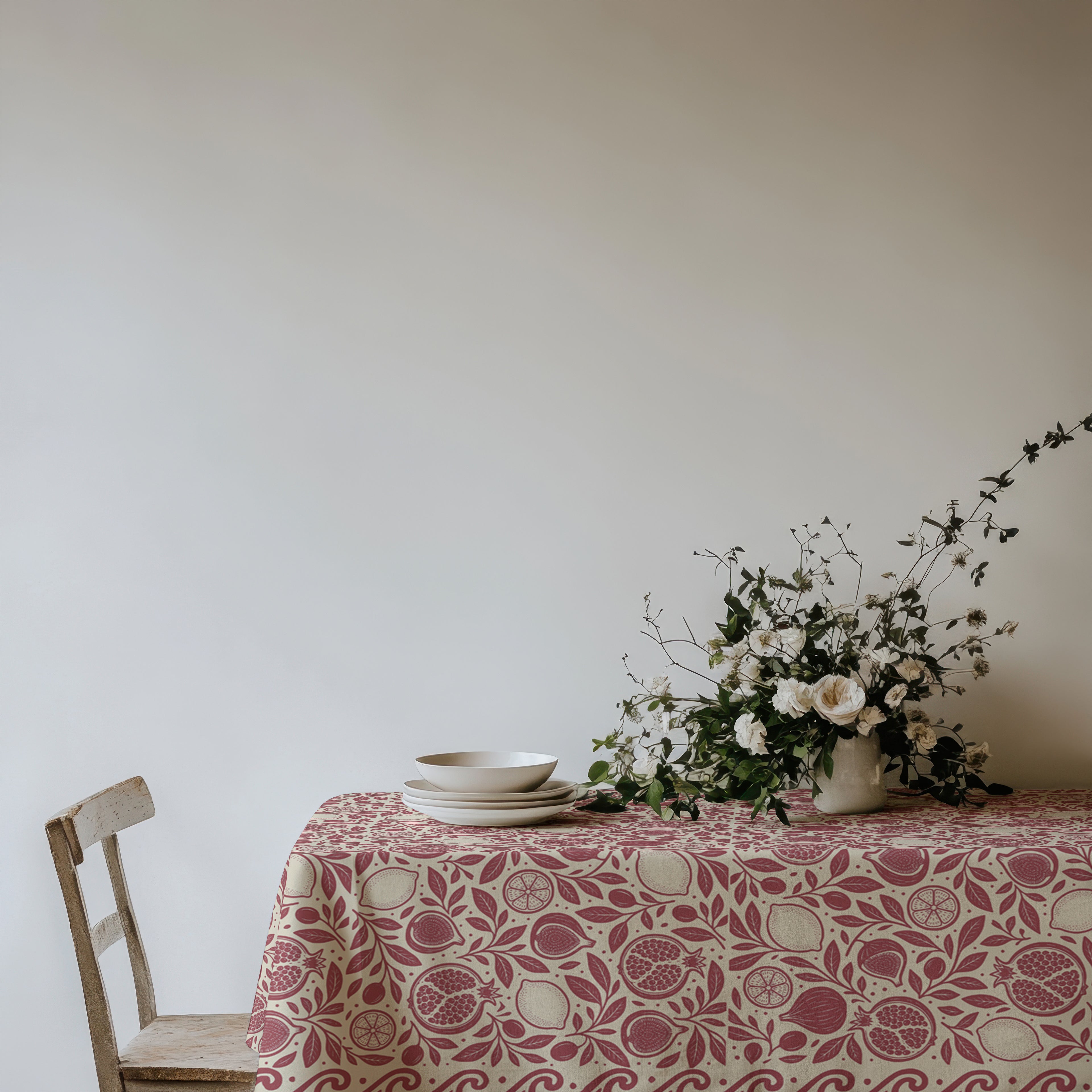 100% cotton twill tablecloth with red pomegranate, fig and lemon botanical design