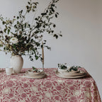Red botanical tablecloth with pomegranates, figs, lemons and leafy branches on cream cotton twill