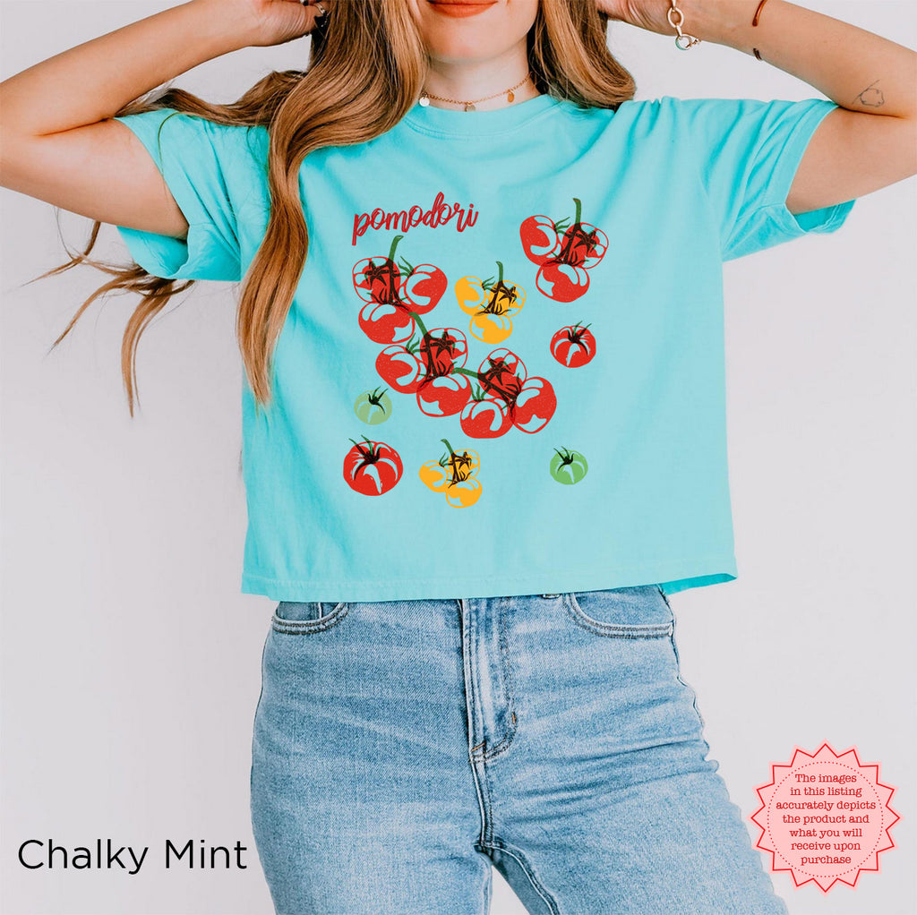 Women’s relaxed boxy graphic tee featuring playful Mediterranean inspired tomato artwork and casual summer style