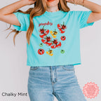 Women’s relaxed boxy graphic tee featuring playful Mediterranean inspired tomato artwork and casual summer style